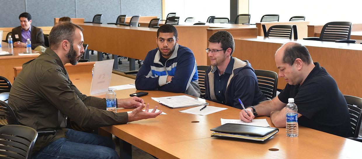 Students meeting with a representative